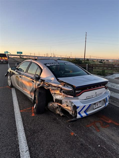 Crash forces Colorado State Patrol trooper to leap off bridge barrier